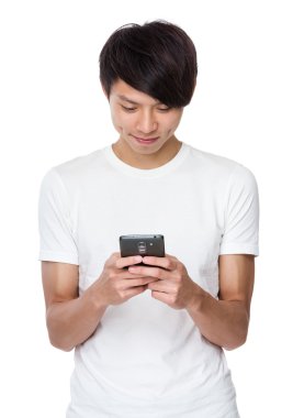 Young university student using the mobile phone