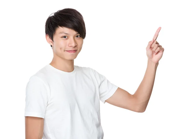 Asian young man showing finger point up — Stok fotoğraf