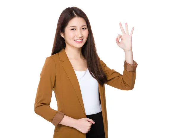 Asian young businesswoman with ok sign gesture — Stock Photo, Image