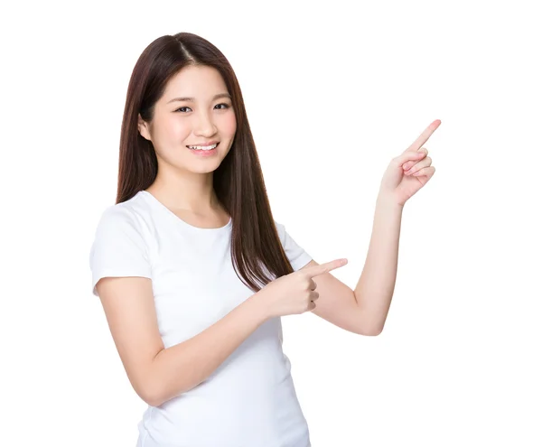 Young woman showing two fingers upwards — Stok fotoğraf