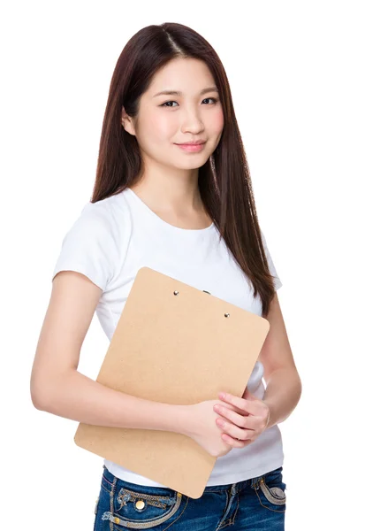 Young woman carrying the clipboard — Stok fotoğraf