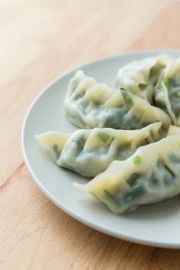 Chinese meat dumplings on the white plate