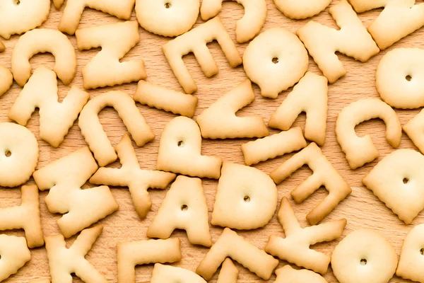 Letters Biscuits on table — Φωτογραφία Αρχείου
