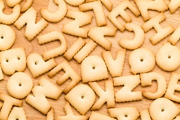 Word Cookies over the wooden table — Stock Photo, Image