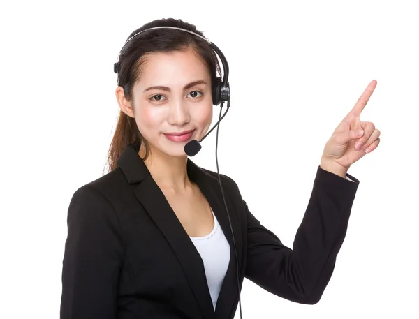 Assistant Customer service met vinger omhoog — Stockfoto