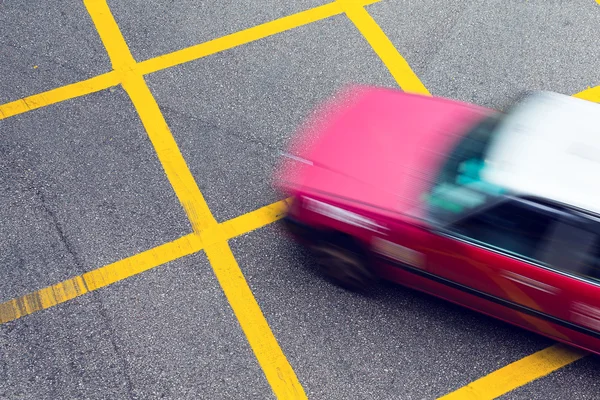 Bewegung verschwommen Taxi in Hongkong — Stockfoto