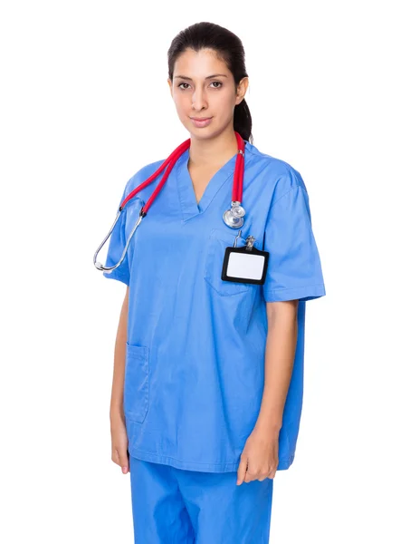 Kobieta lekarz w niebieskim mundurze — Zdjęcie stockowe