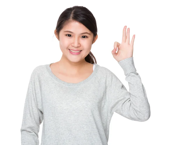 Asian young woman in grey sweater — Stock Photo, Image