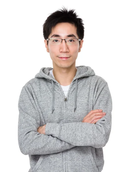 Asiatisk man i grå tröja — Stockfoto