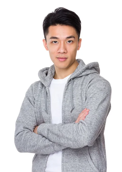 Asiatische schöner Mann in grauen Kapuzenpullover — Stockfoto