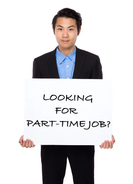 Confident businessman showing a placard — Stock Photo, Image