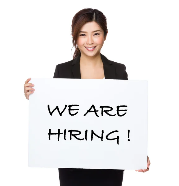 Asian businesswoman holding a placard — Stock Photo, Image