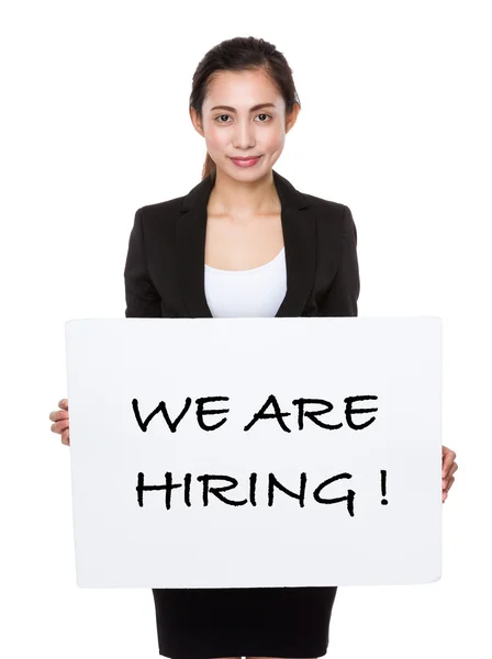 Asian businesswoman holding a placard — Stock Photo, Image