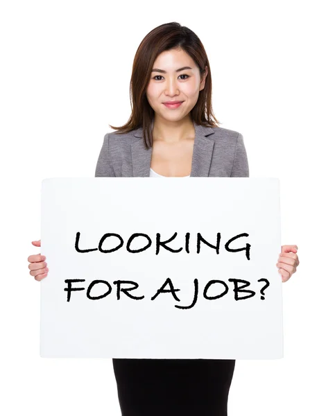 Asian businesswoman holding a placard — Stock Photo, Image