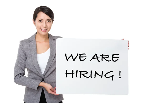 Asian businesswoman holding a placard — Stock Photo, Image