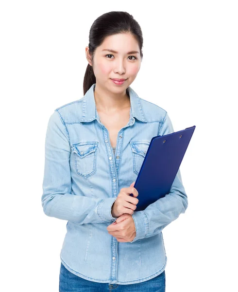 Young asian woman holding clipboard — Stock Photo, Image