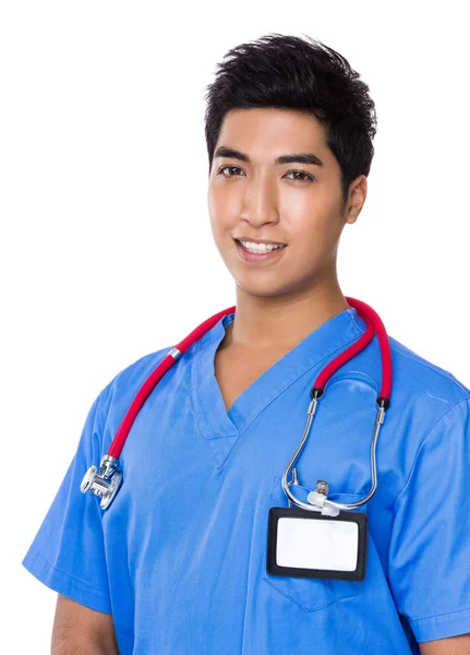 Asiático guapo médico en azul uniforme — Foto de Stock