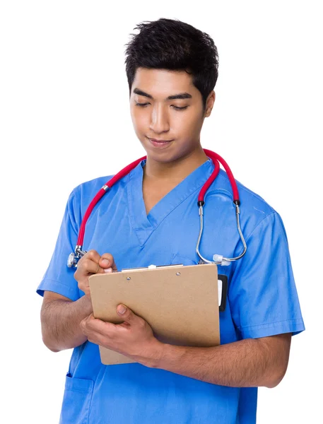 Asiático bonito médico em azul uniforme — Fotografia de Stock