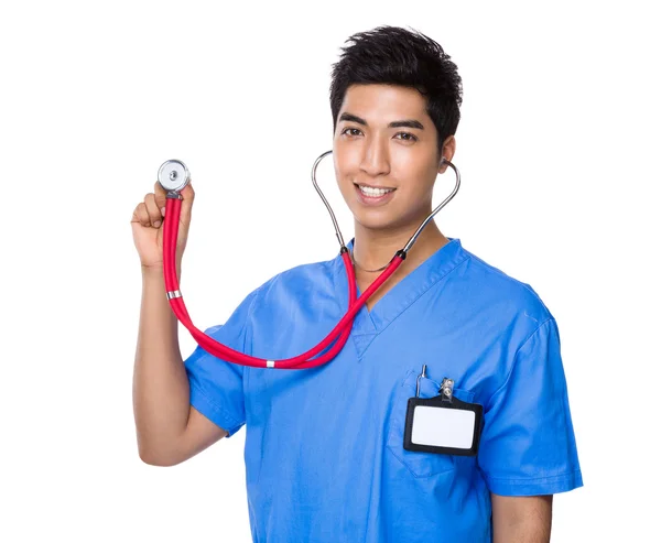 Asiático bonito médico em azul uniforme — Fotografia de Stock