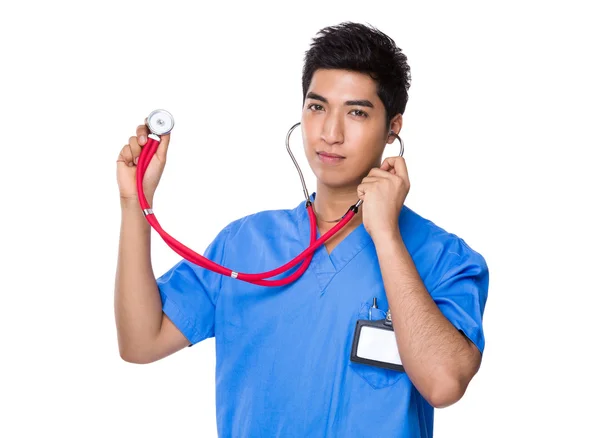 Asiático bonito médico em azul uniforme — Fotografia de Stock