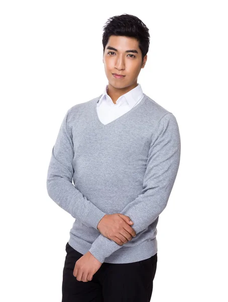 Asiatischer gutaussehender Geschäftsmann im grauen Pullover — Stockfoto