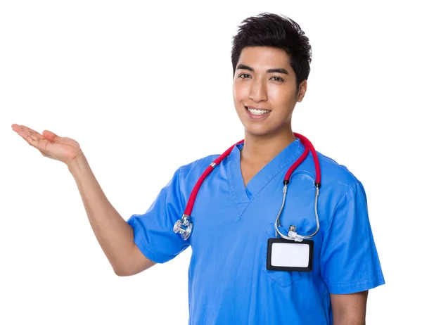 Asian handsome doctor in blue uniform — Stock Photo, Image