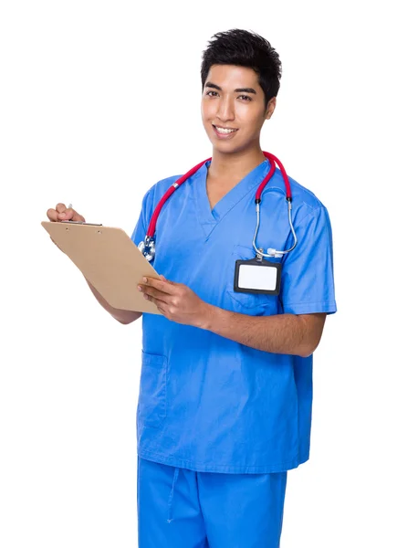 Asiático guapo médico en azul uniforme — Foto de Stock