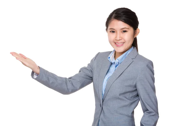 Businesswoman with open hand palm — Stock Photo, Image
