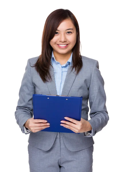 Businesswoman holding  clipboard — Stock Photo, Image