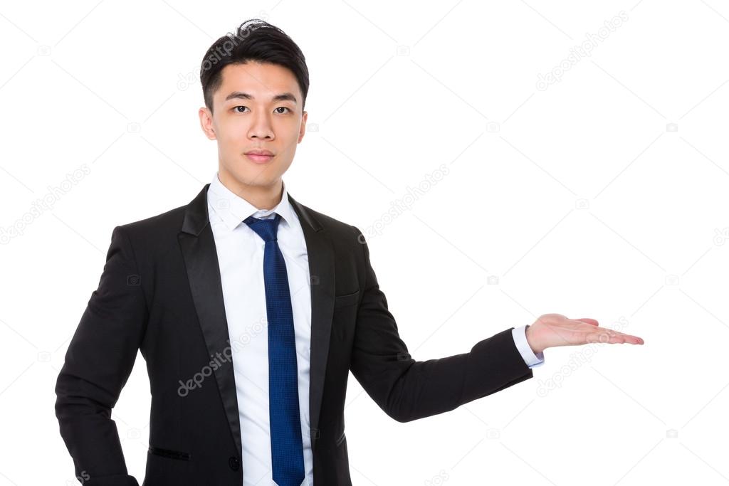 Young asian businessman in business suit