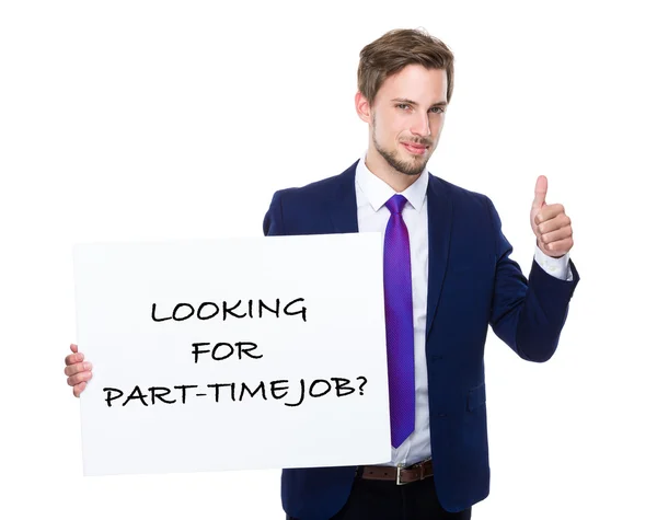 Businessman with thumb up gesture holding placard — Stock Photo, Image