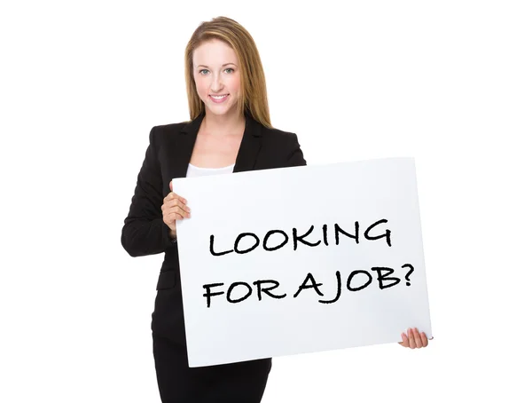 Caucasian young businesswoman with a placard — Stock Photo, Image