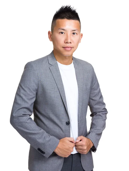 Asian handsome businessman in grey jacket — Stock Photo, Image