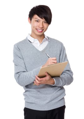 Asya genç işadamı gri süveterli