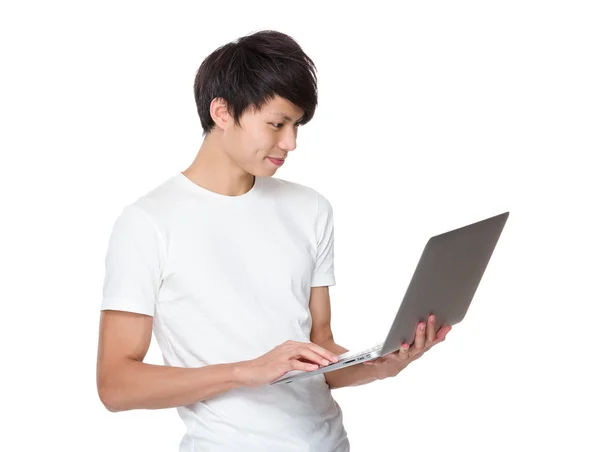 Asian young man in white t-shirt — Stock Photo, Image