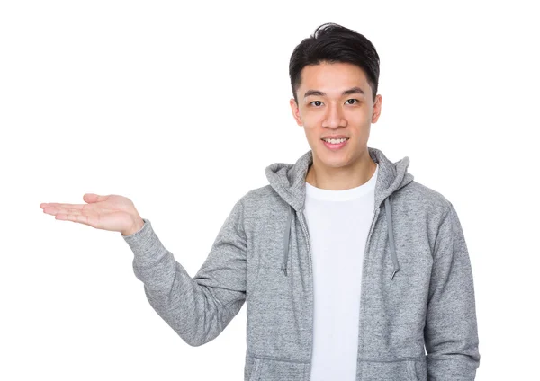 Asian young man in grey hoodie — Stock Photo, Image