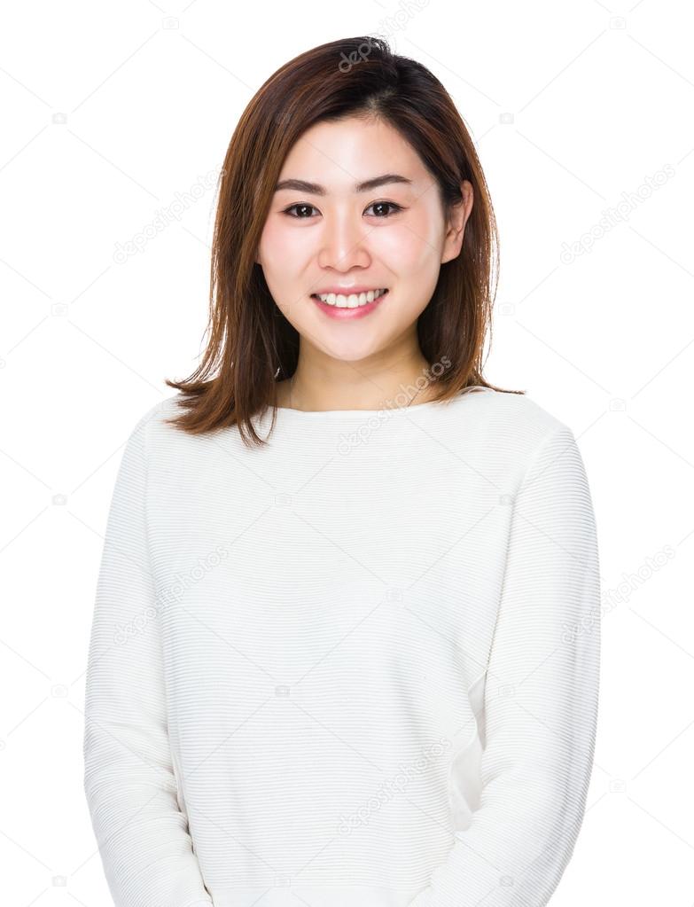 Young asian woman in white sweater on white background