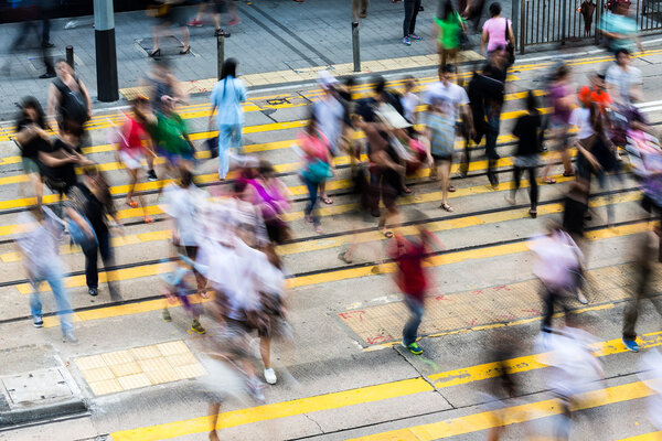 Busy pedestrians crossing in Hong Kong