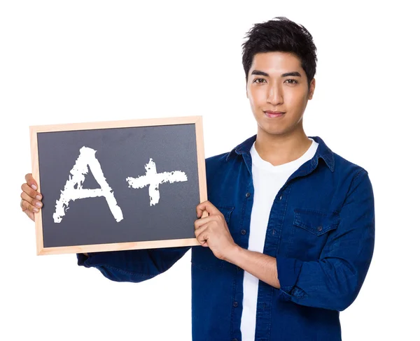 Indian man in blue shirt with chalkboard — Stock Photo, Image