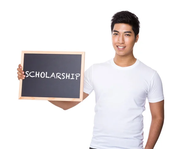 Asian man in white t-shirt with chalkboard — Stock Photo, Image