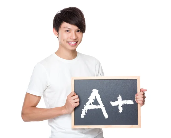 Ásia homem no branco t-shirt com chalkboard — Fotografia de Stock