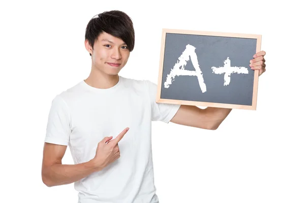 Ásia homem no branco t-shirt com chalkboard — Fotografia de Stock