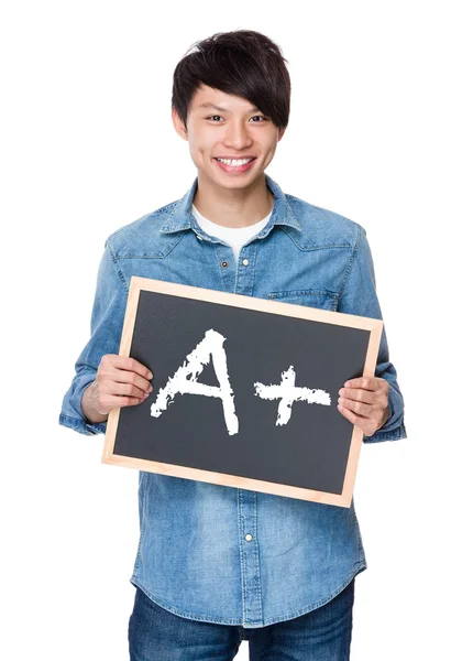 Asian man in jean shirt with chalkboard — Stock Photo, Image