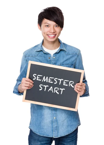 Asian man in jean shirt with chalkboard — Stock Photo, Image