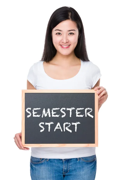 Asian young woman with chalkboard — Stock Photo, Image