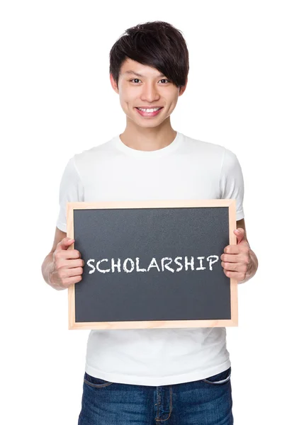 Young asian man with chalkboard — Stock Photo, Image