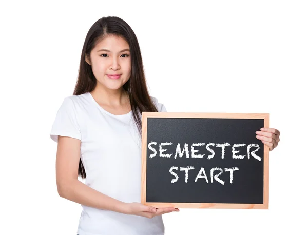 Asian woman in white t-shirt with blackboard — Stock Photo, Image