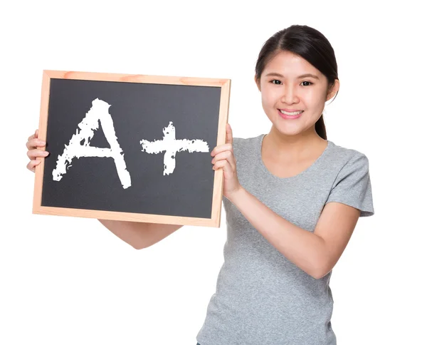 Jovem mulher asiática com placa preta — Fotografia de Stock