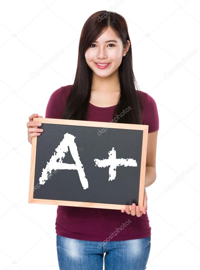 asian woman in red t-shirt with blackboard