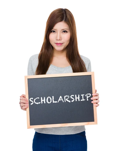 Asian woman in grey sweater with blackboard — Stock Photo, Image